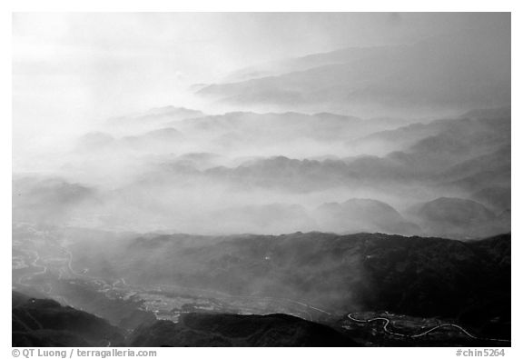 Receding ridges in fog, seen from Jinding Si, morning. Emei Shan, Sichuan, China (black and white)