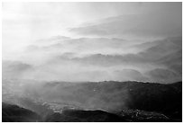 Receding ridges in fog, seen from Jinding Si, morning. Emei Shan, Sichuan, China (black and white)