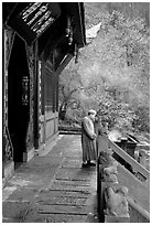 Monk in front of Jieyin Palace. Emei Shan, Sichuan, China ( black and white)