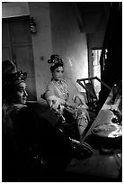 Sichuan opera actors getting ready in the backstage before the performance. Chengdu, Sichuan, China (black and white)