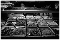 Food stall by night. Sichuan food is among China's spiciest. Chengdu, Sichuan, China (black and white)