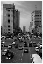 Car traffic on a major avenue. Chengdu, Sichuan, China ( black and white)