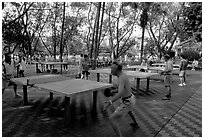 Playing table tennis, Liuha Park. Guangzhou, Guangdong, China (black and white)