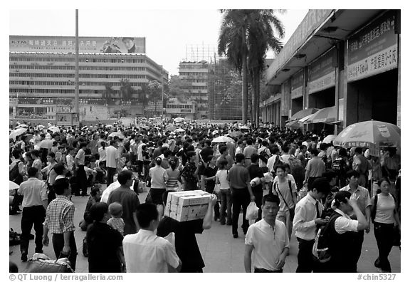 Crowds waiting outside the main train station. Guangzhou, Guangdong, China