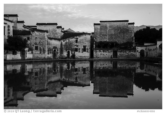 Houses reflected in Moon Pond. Hongcun Village, Anhui, China (black and white)