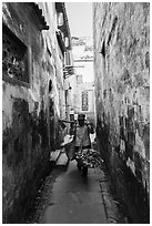 Woman returning from harvest. Xidi Village, Anhui, China ( black and white)