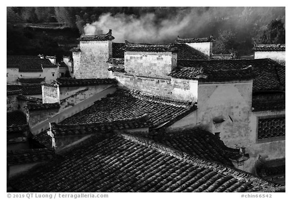 Rooftops and smoke. Xidi Village, Anhui, China (black and white)