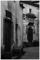 Morning light streaming on walls with lanterns. Xidi Village, Anhui, China ( black and white)