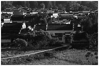 Man on path to village. Xidi Village, Anhui, China ( black and white)