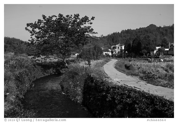 River, path and village. Xidi Village, Anhui, China (black and white)