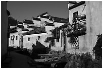 Street with bridges over stream. Xidi Village, Anhui, China ( black and white)