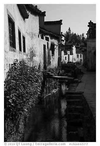Front stream in village street. Xidi Village, Anhui, China (black and white)
