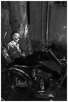 Man sleeping on cyclo. Xidi Village, Anhui, China ( black and white)