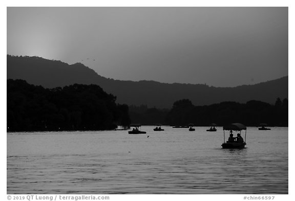 Boats on West Lake at sunset. Hangzhou, China (black and white)