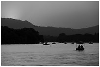 Boats on West Lake at sunset. Hangzhou, China ( black and white)