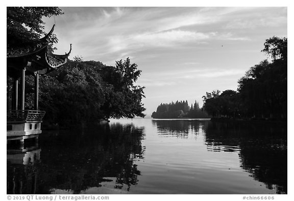 Tree-lined shores and pavilion, West Lake. Hangzhou, China (black and white)