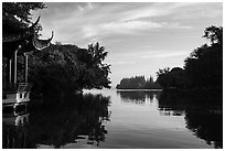 Tree-lined shores and pavilion, West Lake. Hangzhou, China ( black and white)