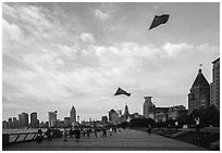 Chinese flats on kite lines, the Bund. Shanghai, China ( black and white)