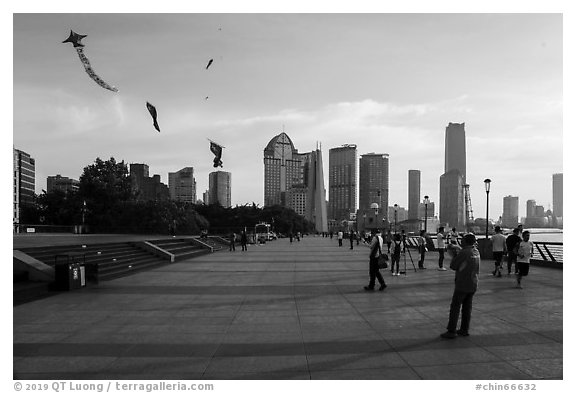 Kites flying above the Bund. Shanghai, China (black and white)