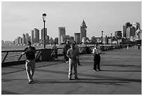 Men flying kites, the Bund. Shanghai, China ( black and white)