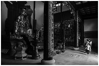 Family visiting Dajing Taoist temple. Shanghai, China ( black and white)