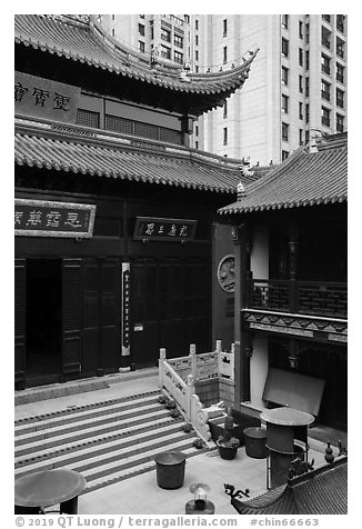 Dajing Taoist temple and modern buildings. Shanghai, China (black and white)