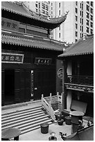 Dajing Taoist temple and modern buildings. Shanghai, China ( black and white)