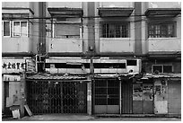 Dilapidated buildings slated for demolition. Shanghai, China ( black and white)