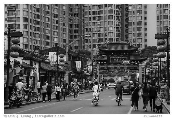 Fangbang Middle Road restored old buildings and modern towers. Shanghai, China (black and white)