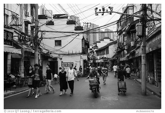 Old street with surveillance cameras. Shanghai, China (black and white)