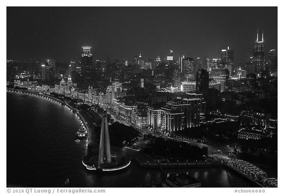 City skyline with illuminated Bund from above. Shanghai, China (black and white)