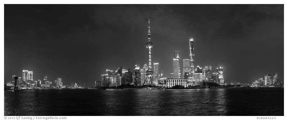 Shanghai city skyline from the Bund at night. Shanghai, China (black and white)