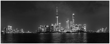 Shanghai city skyline from the Bund at night. Shanghai, China (Panoramic black and white)