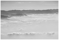Aerial view of mountains above cloud layer. Taiwan (black and white)