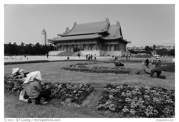 Grounds of Chiang Kai-shek memorial with workers and tourists. Taipei, Taiwan (black and white)