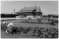 Grounds of Chiang Kai-shek memorial with workers and tourists. Taipei, Taiwan ( black and white)