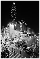 Shopping district street at night and Taipei 101. Taipei, Taiwan (black and white)