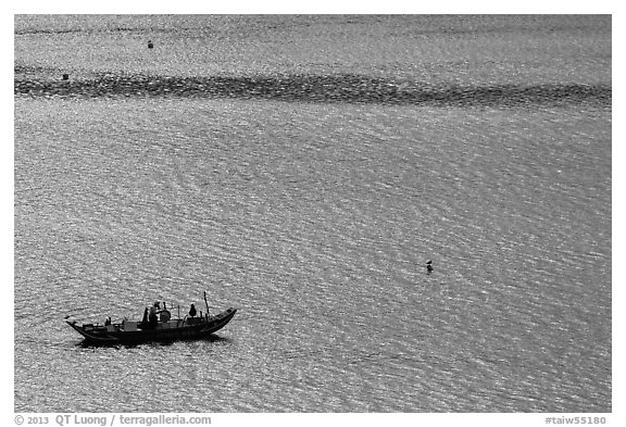 Small boat on Damshui river. Taipei, Taiwan