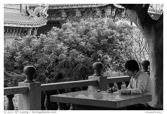 Man reading, Guandu Temple. Taipei, Taiwan (black and white)