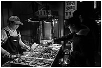 Taiwanese food specialties, Shilin Night Market. Taipei, Taiwan (black and white)