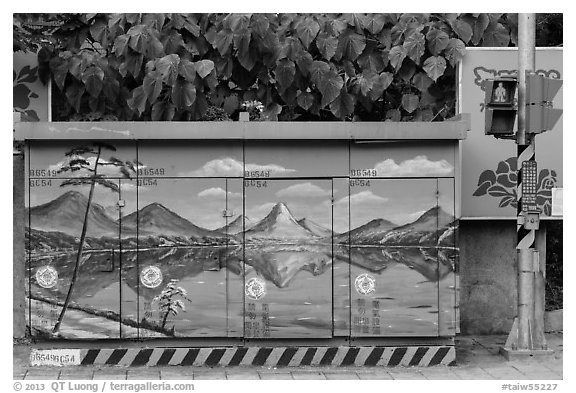 Electric utility boxe with nature landscape painting. Taipei, Taiwan (black and white)