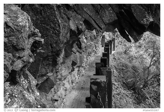 Narrow trail under rock overhang, Taroko Gorge. Taroko National Park, Taiwan