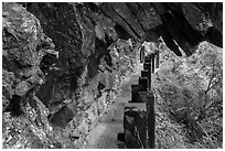 Narrow trail under rock overhang, Taroko Gorge. Taroko National Park, Taiwan (black and white)