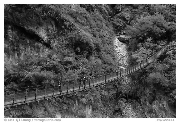 Suspension bridge with hikers. Taroko National Park, Taiwan