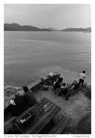 Family fishing. Sun Moon Lake, Taiwan (black and white)