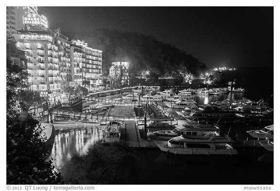 Harbor and waterfront at night, Shueishe Village. Sun Moon Lake, Taiwan (black and white)
