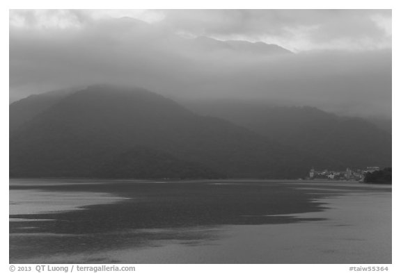 Itashao Village and cloud-shrounded mountains at dawn. Sun Moon Lake, Taiwan (black and white)
