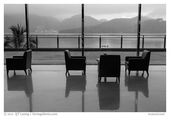 Chairs in hotel lobby with view of lake. Sun Moon Lake, Taiwan (black and white)