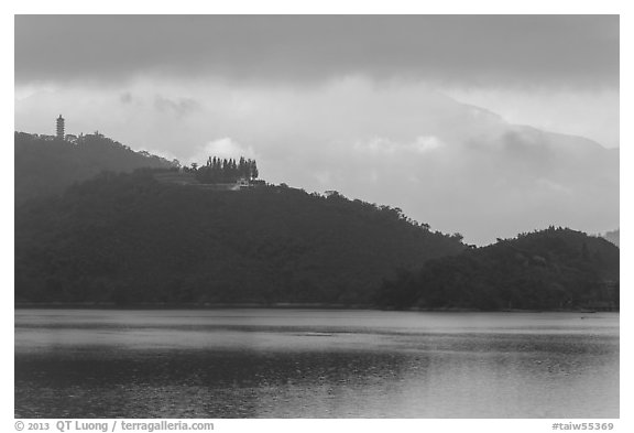 Shabalan Mountain ridge in mist with Syuanzang Temple and Tsen Pagoda. Sun Moon Lake, Taiwan (black and white)