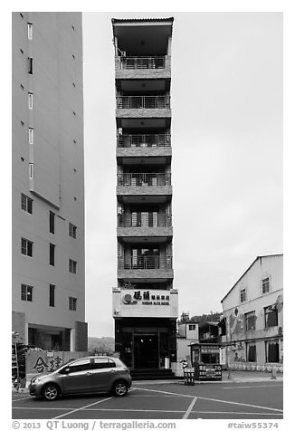 Tall and thin hotel building. Sun Moon Lake, Taiwan (black and white)